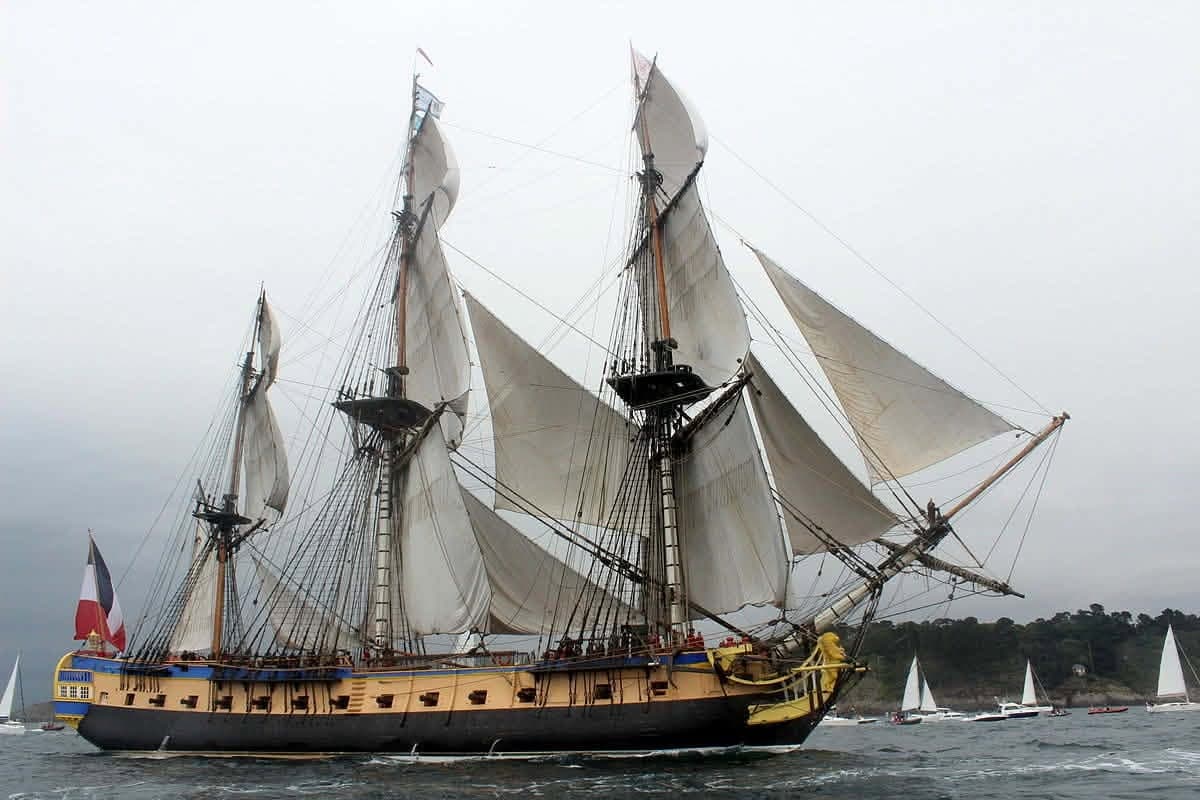 The frigate L'Hermione under sail, the 1779 ship that gave the knife its name